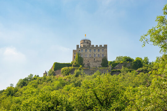 Pyrmont Castle. Germany. Burg Pyrmont.  Pyrmont Castle is enthroned on a mighty slate rock above a rushing waterfall on the Elzbach river.