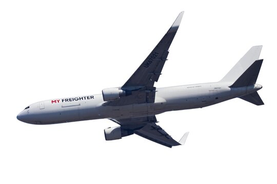 Cargo airplane Boeing 767 My Freighter flying isolated on a white background.