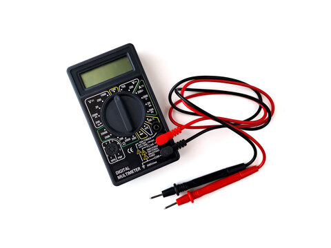 Black digital multimeter with red and black test leads on white background.