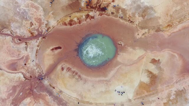 Aerial View of the Devil's Eye Salt Lake in Qinghai, China with Vibrant Mineral Colors and Natural Patterns