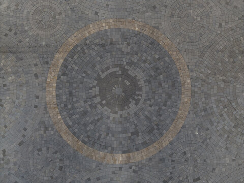 Aerial view of the circular stone pavement pattern at Titik Nol Kilometer Yogyakarta, featuring intricate radial designs in Kecamatan Gondomanan, Daerah Istimewa Yogya, Indonesia.