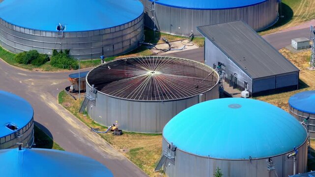 Drone Aerial Video of Large Biogas Plant with Blue and White Domes