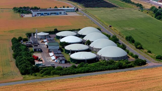 Drone Aerial Video of White Dome Biogas Plant with Industrial Buildings