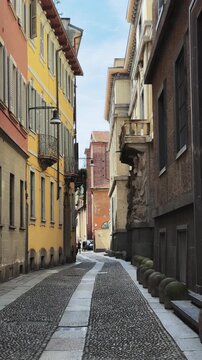 Milan's Historic Cobblestone Street by Chiesa del Carmine