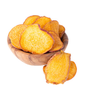 Crispy roasted sweet potato chips with sea salt, isolated on white background. Healthy and crunchy natural vegetable snack. Clipping path.
