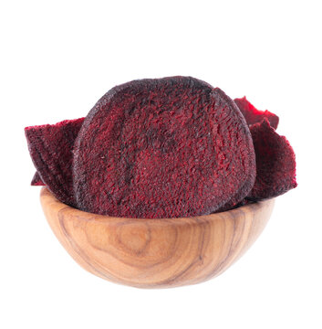 Crispy roasted beetroot chips with sea salt, isolated on white background. Healthy and crunchy natural vegetable snack. Clipping path.