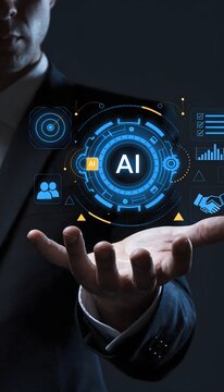 Businessman in a dark suit holding a glowing holographic AI interface with business icons, gears, and data charts, representing artificial intelligence in corporate strategy.