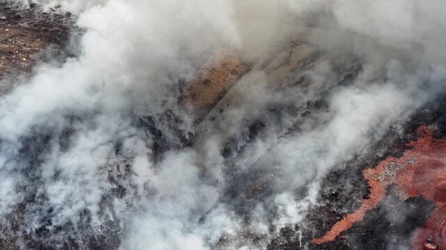 Aerial drone footage of landfill fire and smoke