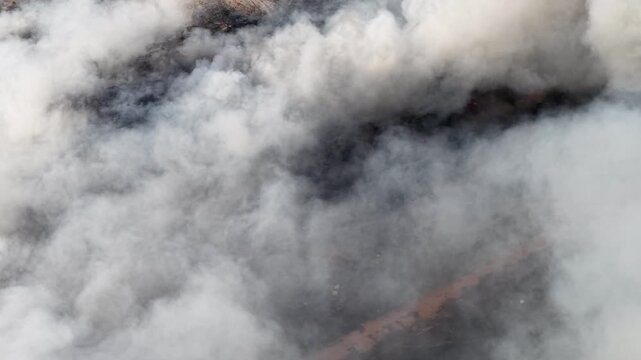 Aerial drone footage of fire at landfill site