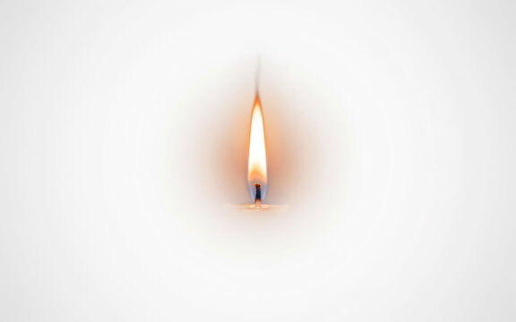 Glowing candle flame on white background, flickering orange fire light, warm burning wick for spiritual meditation or memorial concept