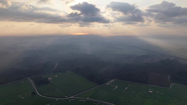 Aerial shot captures rolling hills at dusk