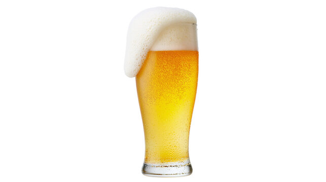 Tall glass of golden beer with overflowing foam head