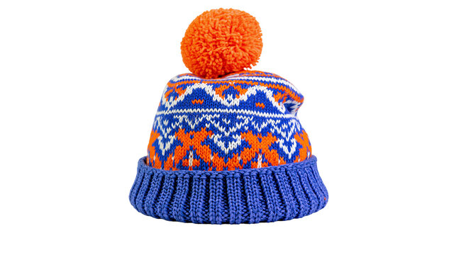Blue knitted beanie with orange and white fair isle pattern and pompom