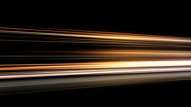 Abstract background with golden light streaks and motion blur effect on black.