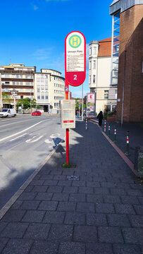 Iserlohn, Germany - June 10, 2026: Unnaer Platz bus stop sign with MVG and Westfalentarif route information