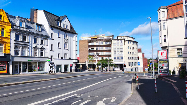 Iserlohn, Germany - June 10, 2026: Commercial buildings with Kaufland, Woolworth, KiK and Apotheke storefront signs