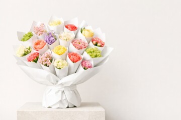 dopamine Bouquet of vibrant flowers in white paper wrap symbolizing mental health © dvoevnore