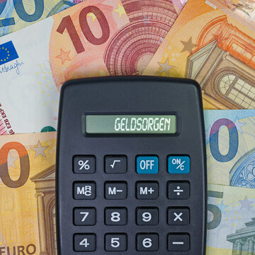 Taschenrechner mit dem Wort Geldsorgen im Display