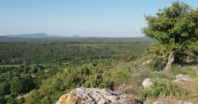 Rocky spur of Moissac-Bellevue in Provence offering a view to the south over the P&eacute;lenc forest, the Massif des Maures and the Sainte Baume, the Monts Bessillon and Fox-Amphoux
