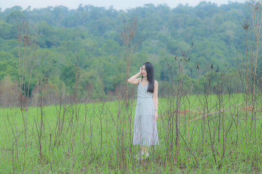 Young Woman in White Outfit Traveling in Natural Landscape, Khao Yai