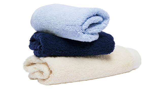 Stack of three fluffy terry cloth towels in blue navy, and cream