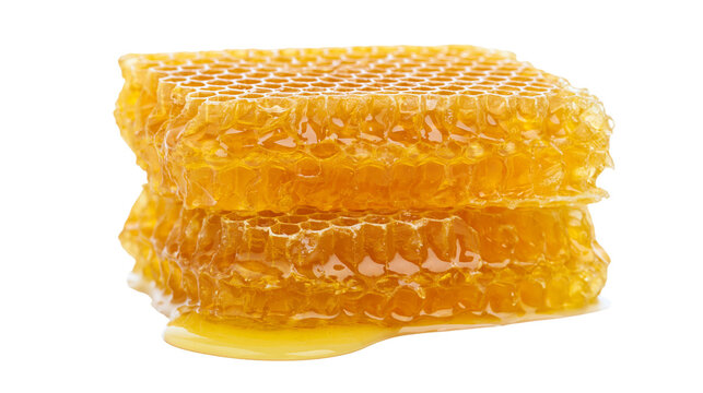 Stack of fresh honeycomb with dripping honey