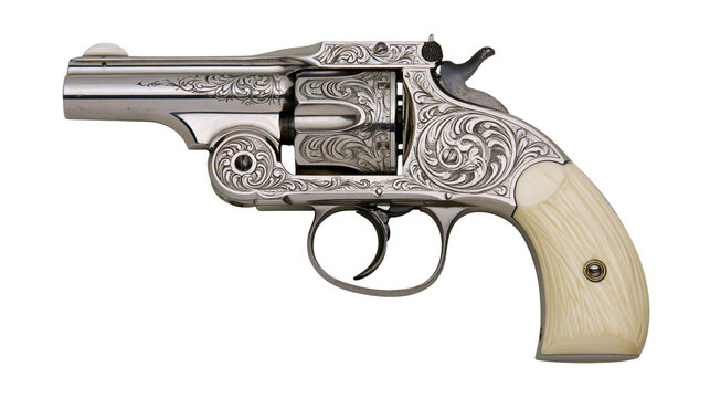 Engraved silver revolver with ivory grips