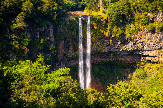 The famous twin cascades of Chamarel in the south of Mauritius. Tallest waterfalls of the tropical island (Indian Ocean). Popular touristic sight and natural wonder seen from an elevated view point.