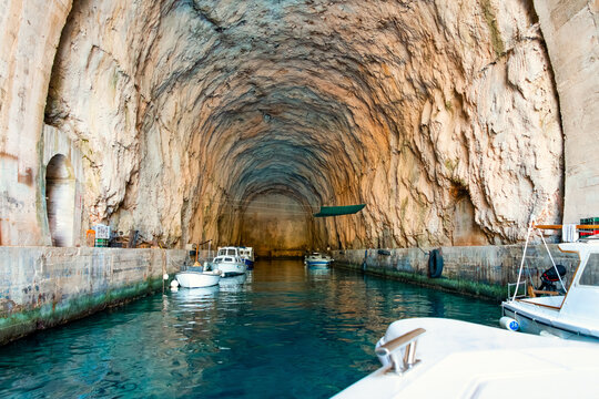 Submarine bunker on the island of Brac near Milna (Croatia). This cave-like hideout was blasted into the cliffs along the Adriatic coast during the communist era in Yugoslavia. Today, it serves as a s
