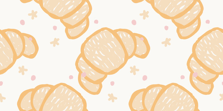 Seamless background pattern with large hand drawn golden croissants and tiny sparkles
