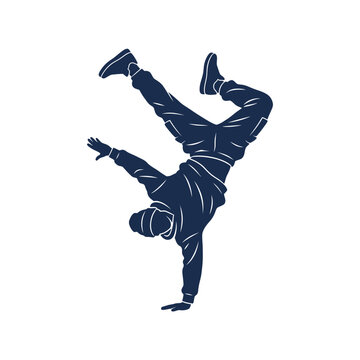 Silhouette of a breakdancer performing a handstand.