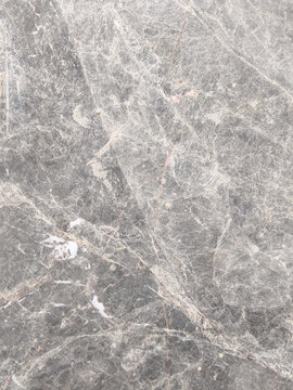 Natural bardiglio grey marble stone texture with organic white veins pattern for luxury flooring surface cladding
