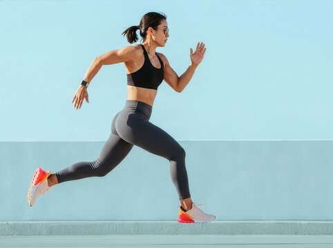 Fit woman running.