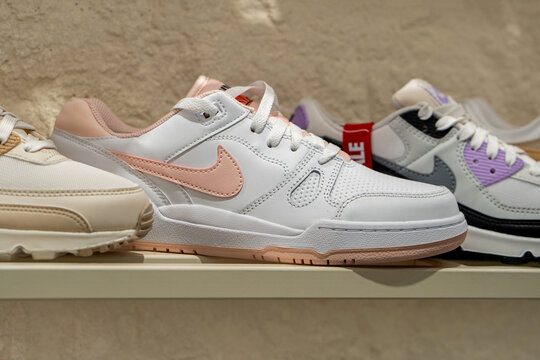 Brand new Nike sneakers shoes. Nike casual sports shoes on showcase in shoe store. Minsk, Belarus - March 30, 2026
