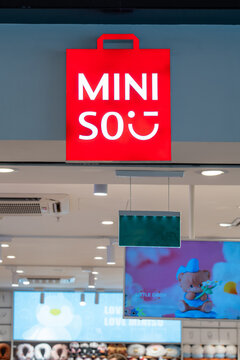 The signboard MINISO store. Miniso brand retail store logo sign. Miniso signage above the entrance to the shop. Minsk, Belarus - March 30, 2026