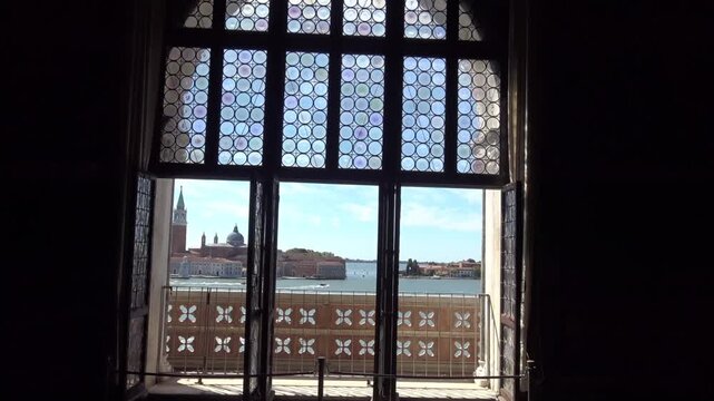 View of San Giorgio Maggiore through a Gothic Window in the Doge's Palace, Venice, Italy
