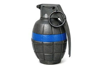 Fototapeta premium A close-up of a black and blue hand grenade on a white background