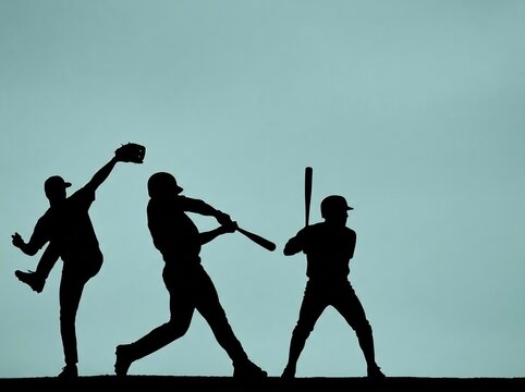 青い空に映える野球選手たちの躍動感あふれるシルエット