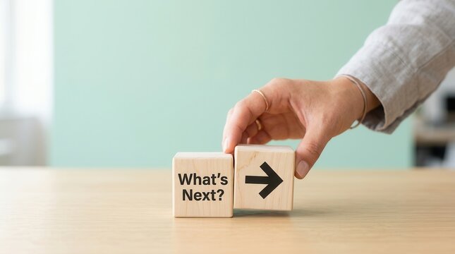 Planning the next step of work and project implementation using wooden cubes with arrow.