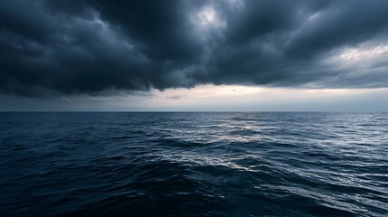 Fototapeta premium Calm ocean waves meet swirling storm clouds creating a tranquil and inviting atmospheric seascape