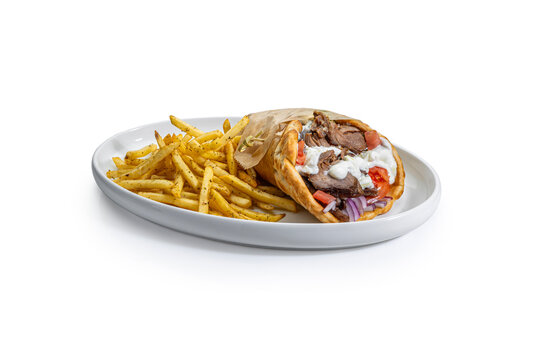 Traditional Greek Lamb Gyro Wrap with Seasoned French Fries on White Background