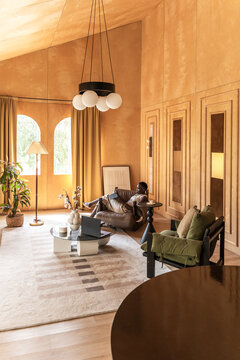 Cozy Living Room With Modern Furniture and Warm Colors in Daylight