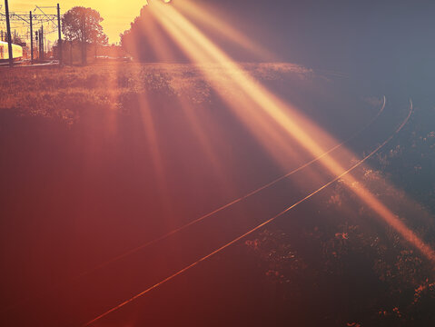 Dramatic ray of light on the railway track illustration