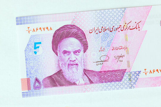 Iranian 50000 Rial currency cash with portrait of Ayatollah Khomeini, representing nation financial system heritage.