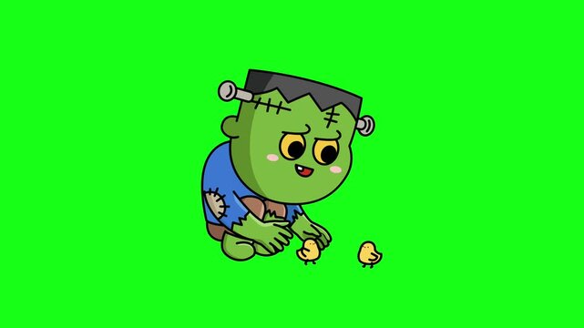  Animated loop of a friendly monster Frankenstein sitting down and playing with two cute yellow chicks on a green screen. Ideal for kid-friendly Halloween media