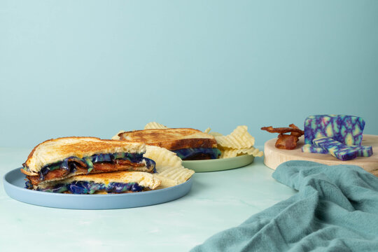 Ube gouda cheese and bacon grilled cheese sandwich and chips