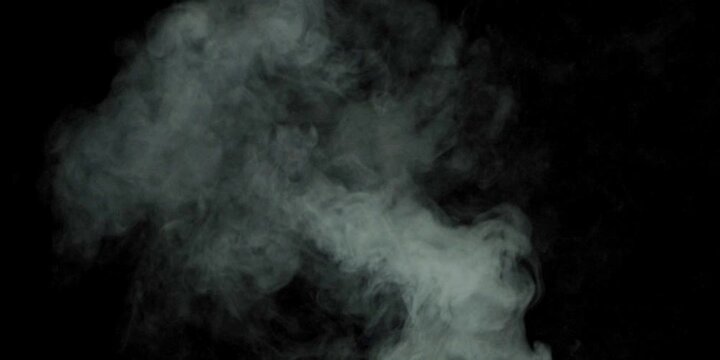 White smoke on a black background. Slow motion. Vape smoke. Vapor , fog, ice smoke cloud , realistic smoke cloud best for using in 4k composition.