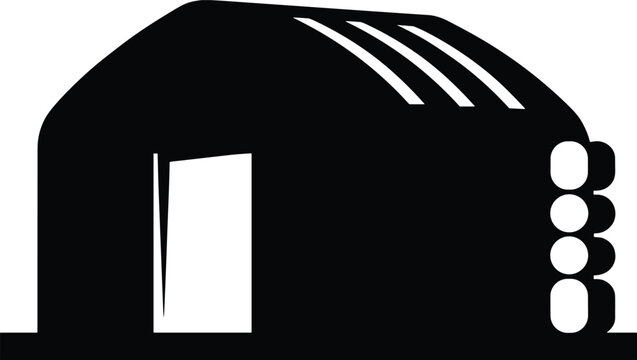 Silhouette illustration of curved roof building with doorway and circular windows resembling simple Quonset hut structure