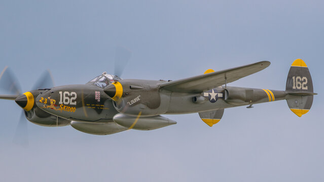 Lockheed P-38 Lightning twin boom fighter in flight