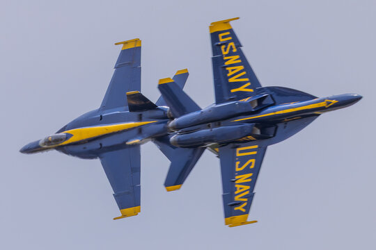 Blue Angels F/A-18 Super Hornets in close opposing pass